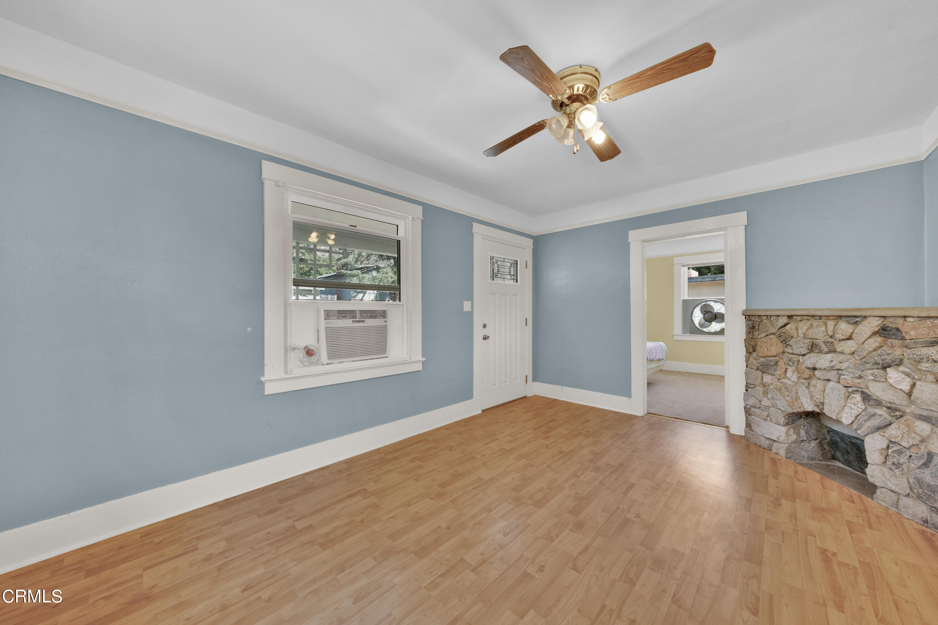 6520 Valmont Street Tujunga, CA 91042 - Photo 13 of 35 a view of livingroom with hardwood floor and ceiling fan