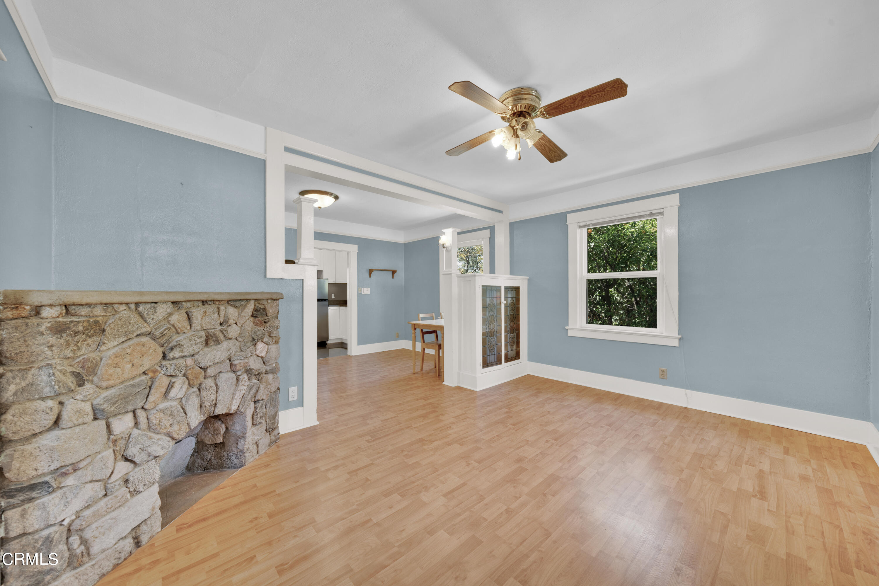 6520 Valmont Street Tujunga, CA 91042 - Photo 14 of 35 a view of an empty room with window and wooden floor