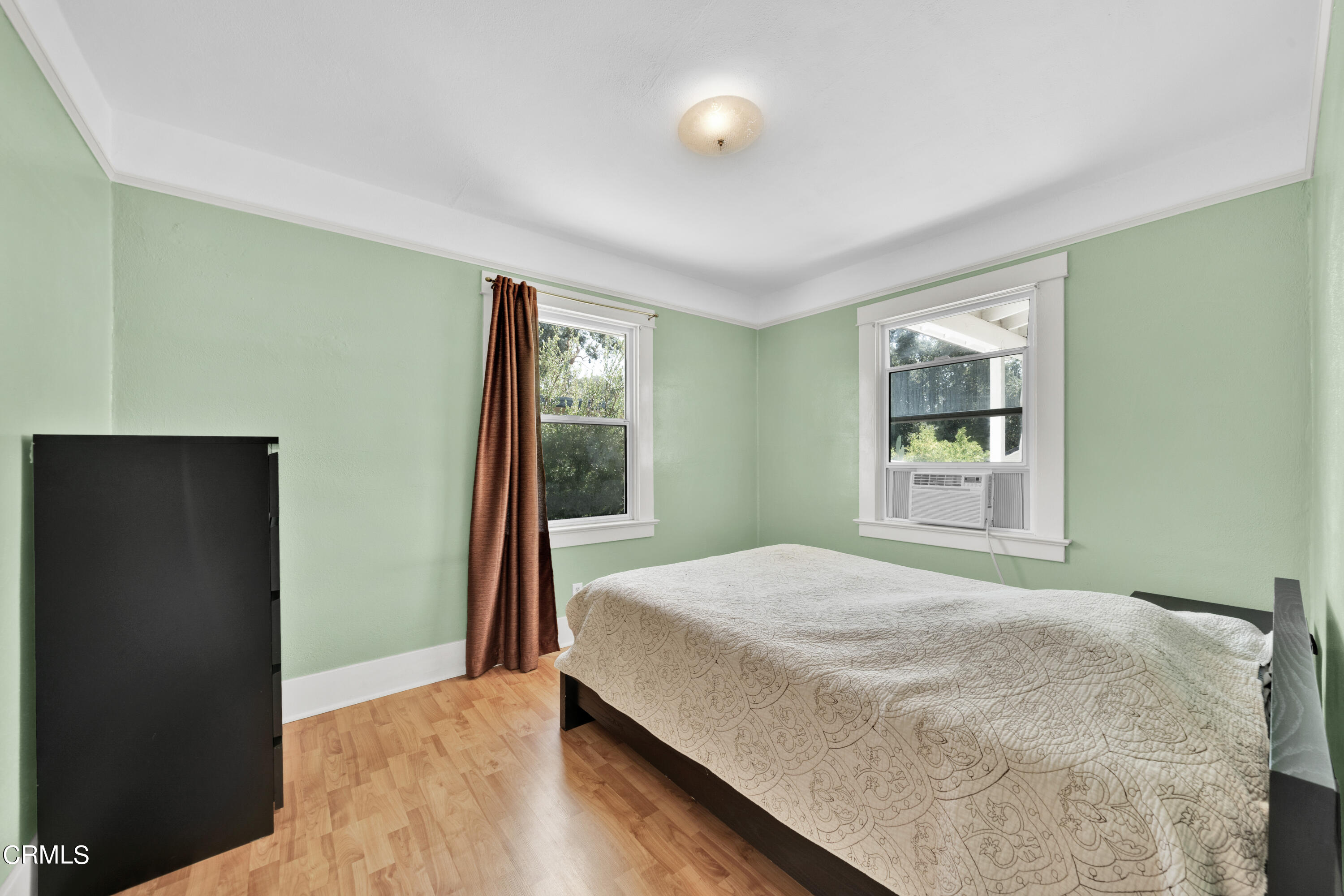 6520 Valmont Street Tujunga, CA 91042 - Photo 23 of 35 a bedroom with a bed and a window