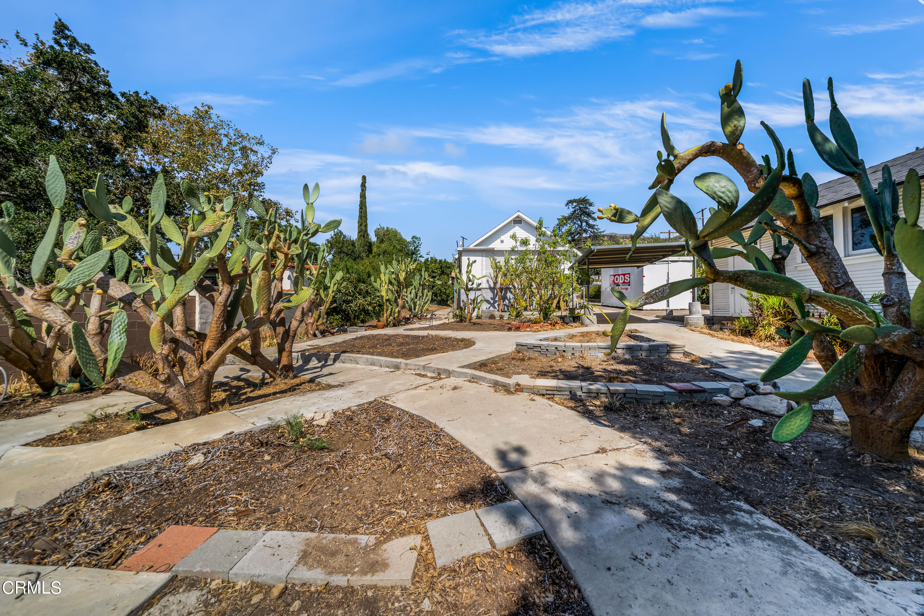 6520 Valmont Street Tujunga, CA 91042 - Photo 31 of 35 a view of a yard with cars