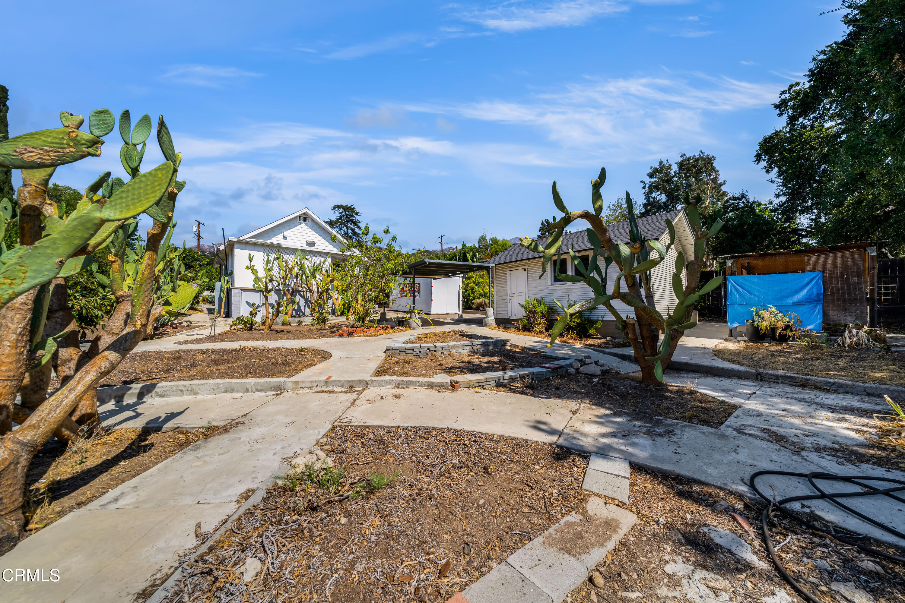 6520 Valmont Street Tujunga, CA 91042 - Photo 32 of 35 a view of a yard with cars