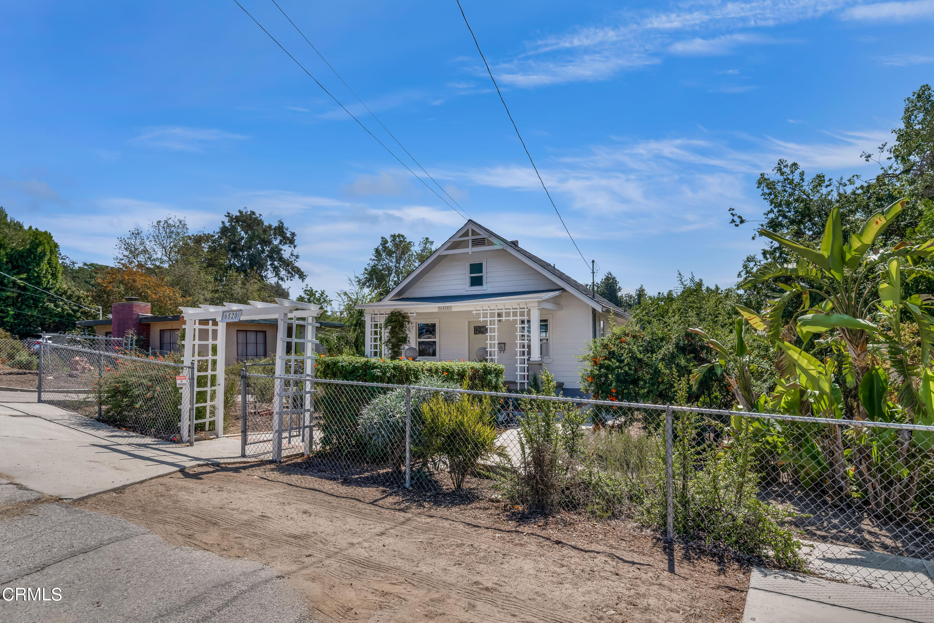 6520 Valmont Street Tujunga, CA 91042 - Photo 8 of 35 a front view of a house with plants