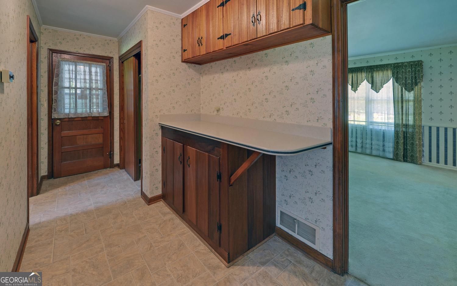 400 Harris Street Toccoa, GA 30577 - Photo 12 of 49 wooden floor and window in an empty room