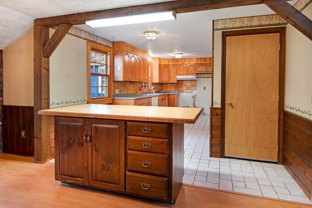 11 Beech Street Oxford, MA 01540 - Photo 11 of 40 a bathroom with a sink a vanity and a mirror