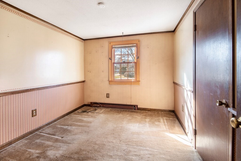 11 Beech Street Oxford, MA 01540 - Photo 20 of 40 a view of an empty room with a window