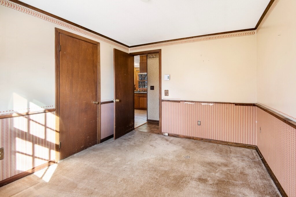 11 Beech Street Oxford, MA 01540 - Photo 21 of 40 a view of an empty room with a window