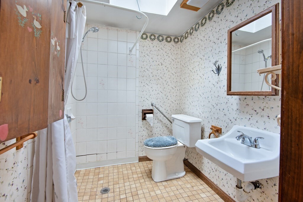 11 Beech Street Oxford, MA 01540 - Photo 27 of 40 a bathroom with a sink toilet and shower