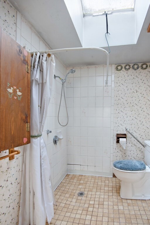 11 Beech Street Oxford, MA 01540 - Photo 28 of 40 a bathroom with a shower and a toilet