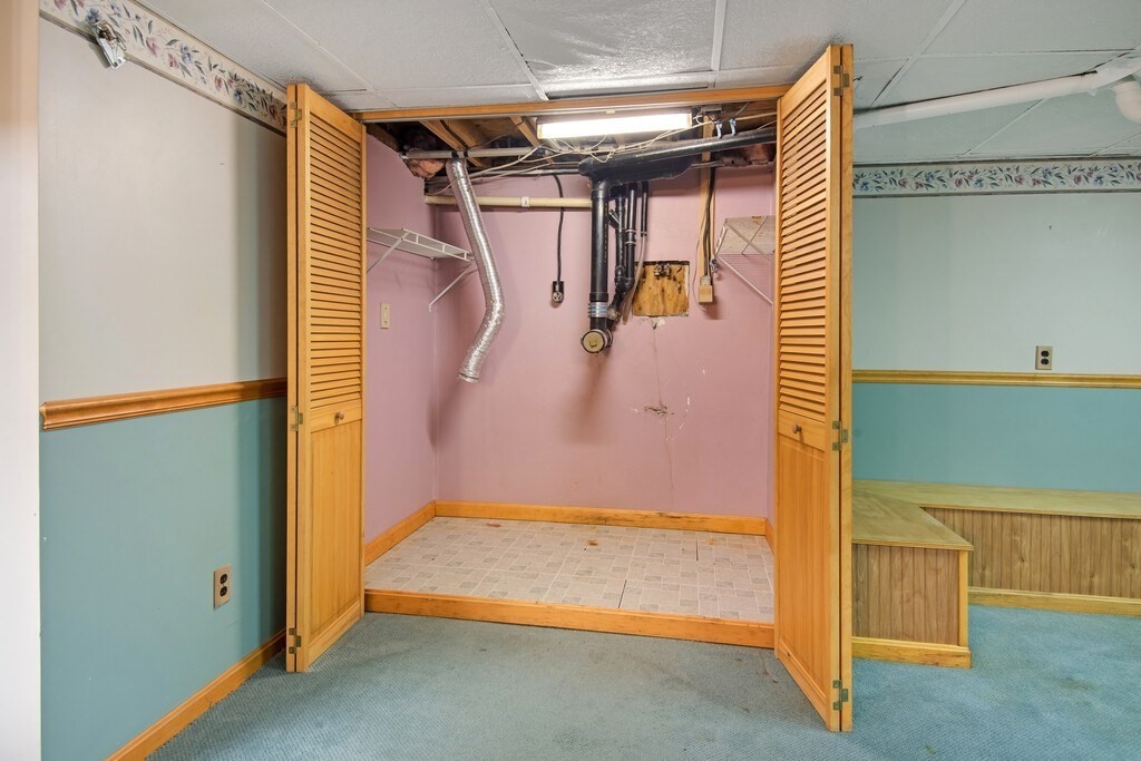 11 Beech Street Oxford, MA 01540 - Photo 36 of 40 a view of walk in closet with window