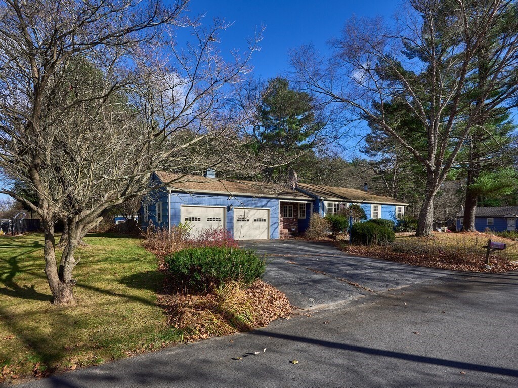 11 Beech Street Oxford, MA 01540 - Photo 5 of 40 a front view of a house with a garden