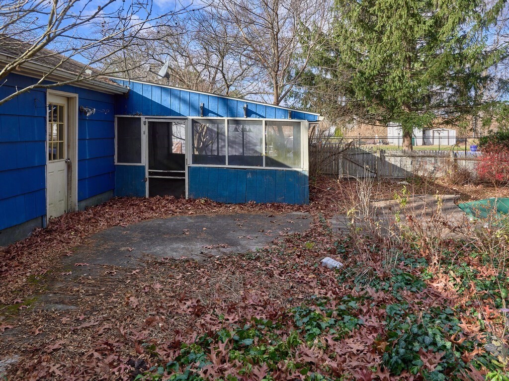 11 Beech Street Oxford, MA 01540 - Photo 7 of 40 a view of backyard with large trees and wooden fence