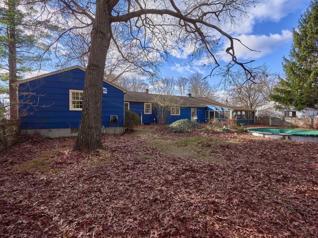 11 Beech Street Oxford, MA 01540 - Photo 8 of 40 a view of a house with a yard tree and a large tree