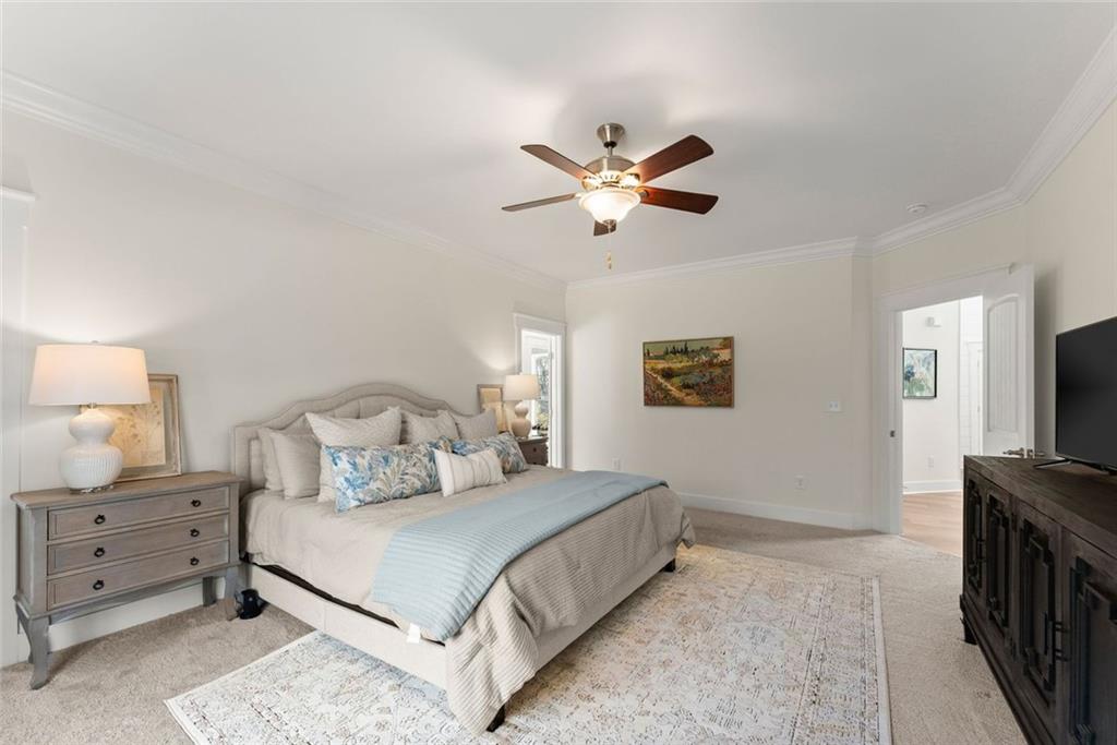 6998 Britt Gailey Road Clermont, GA 30527 - Photo 31 of 92 a bedroom with a bed and a tv