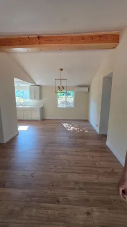 a view of an empty room and window