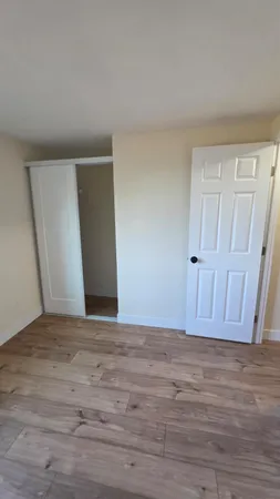 a view of room with hardwood floor
