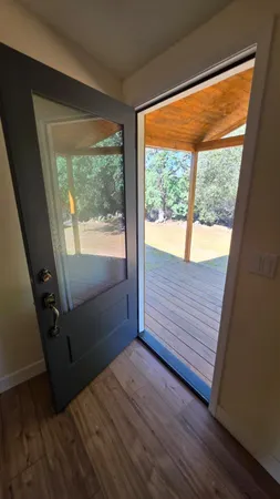 a view of front door and deck