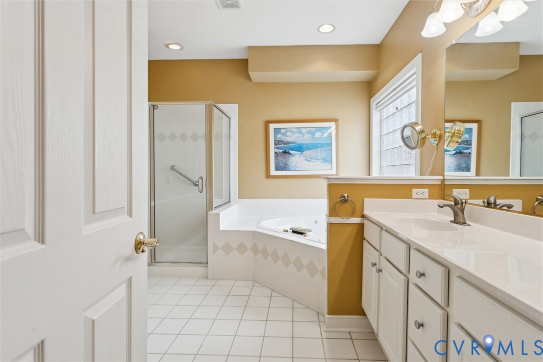 3143 Cider House Road Toano, VA 23168 - Photo 29 of 50 Bathroom with a shower stall, vanity, light tile p