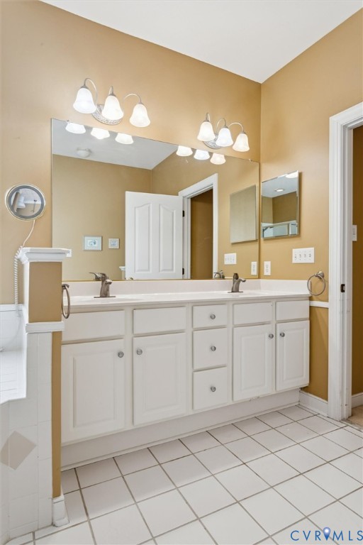 3143 Cider House Road Toano, VA 23168 - Photo 30 of 50 Full bath with double vanity and light tile patter
