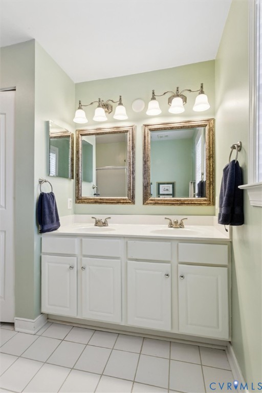 3143 Cider House Road Toano, VA 23168 - Photo 33 of 50 Full bathroom featuring double vanity and light ti