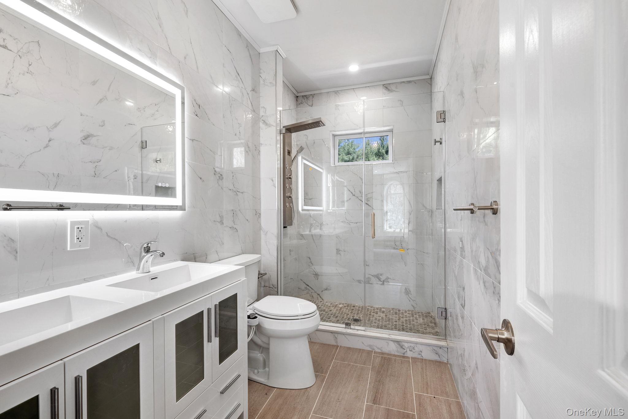 57 Haddock Road Monticello, NY 12701 - Photo 33 of 42 a bathroom with a sink a toilet and shower