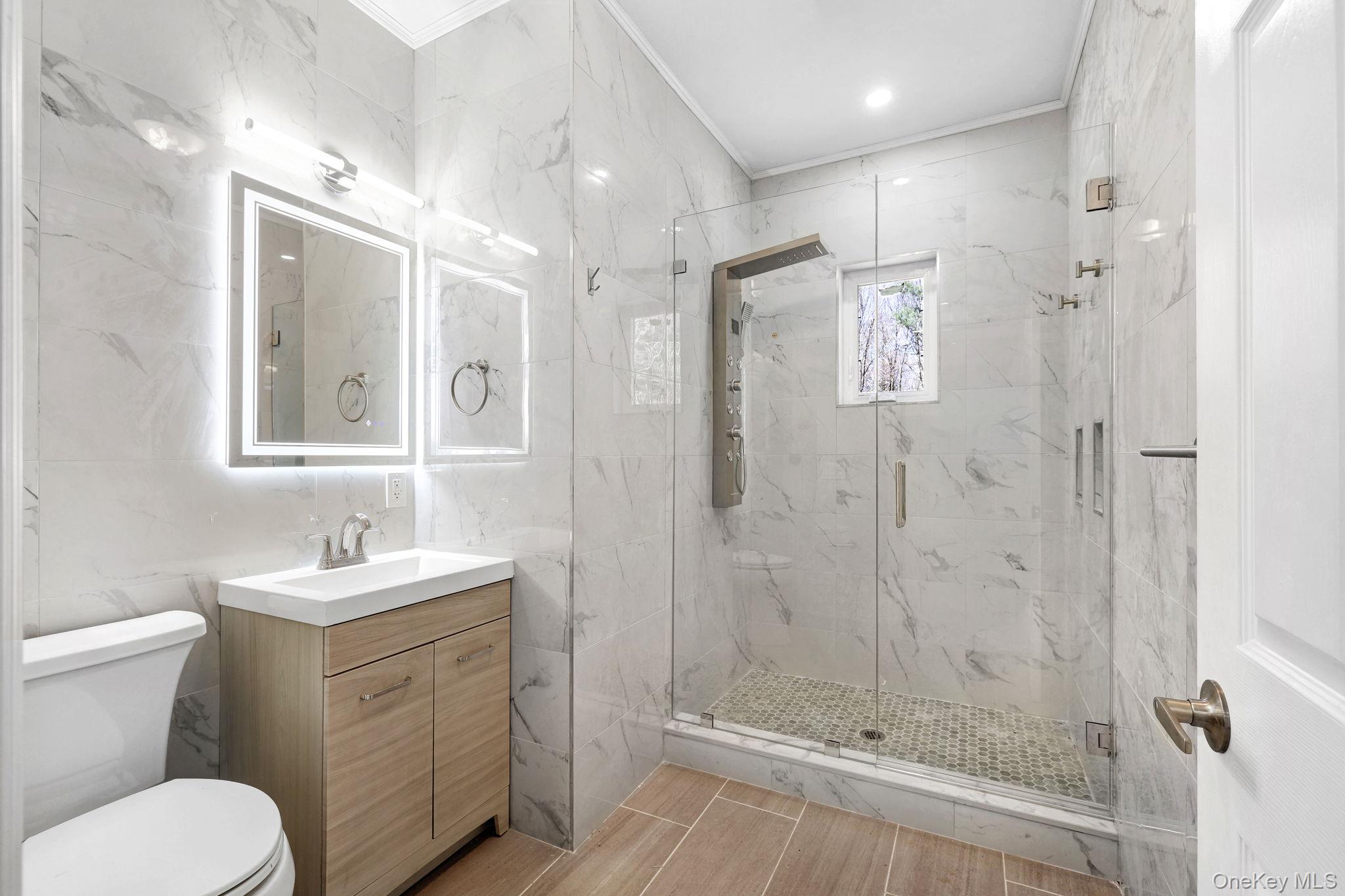 57 Haddock Road Monticello, NY 12701 - Photo 39 of 42 a bathroom with a sink toilet and shower