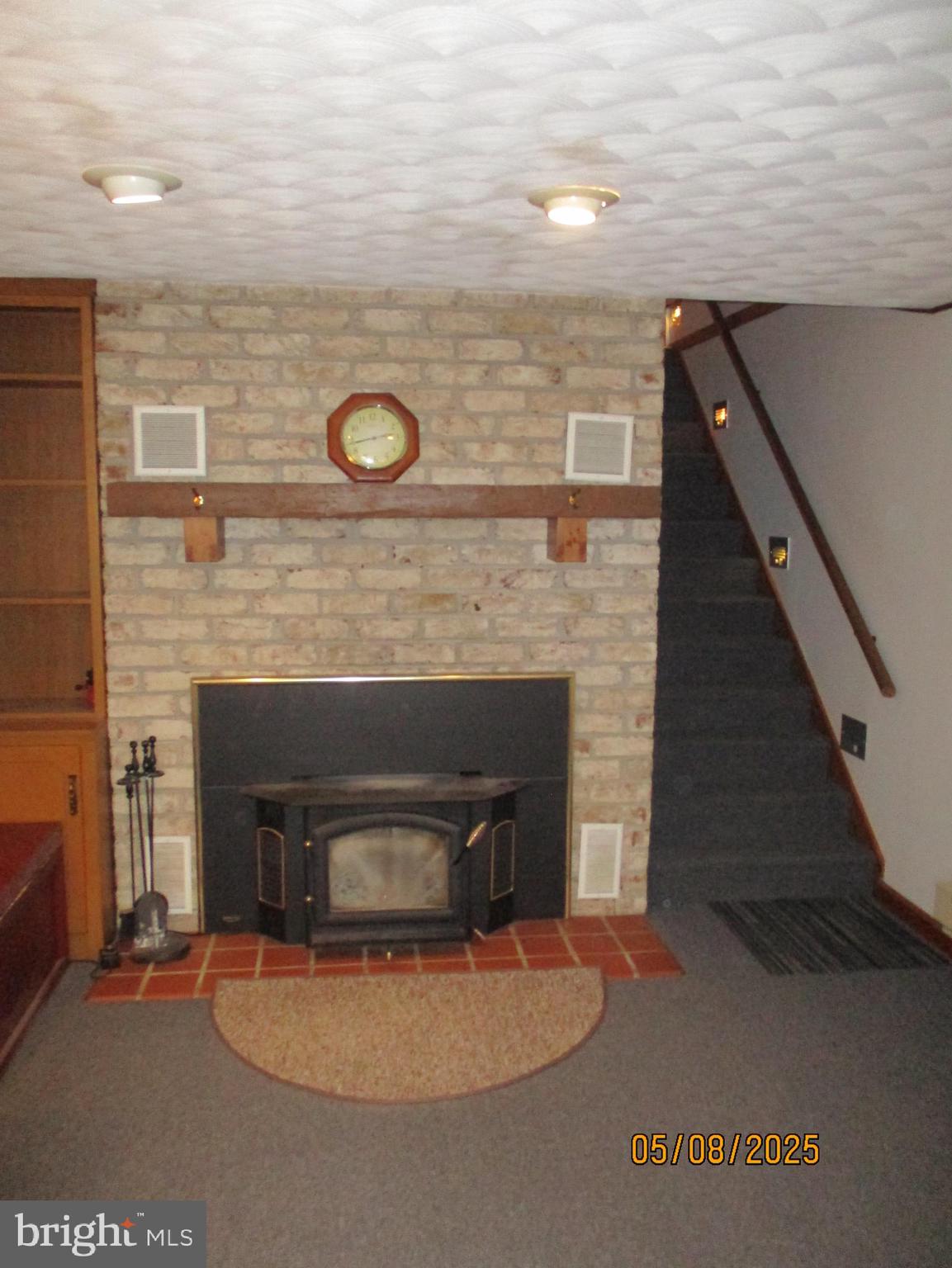 9 Montsera Road Carlisle, PA 17015 - Photo 115 of 142 a fireplace with a wooden floor