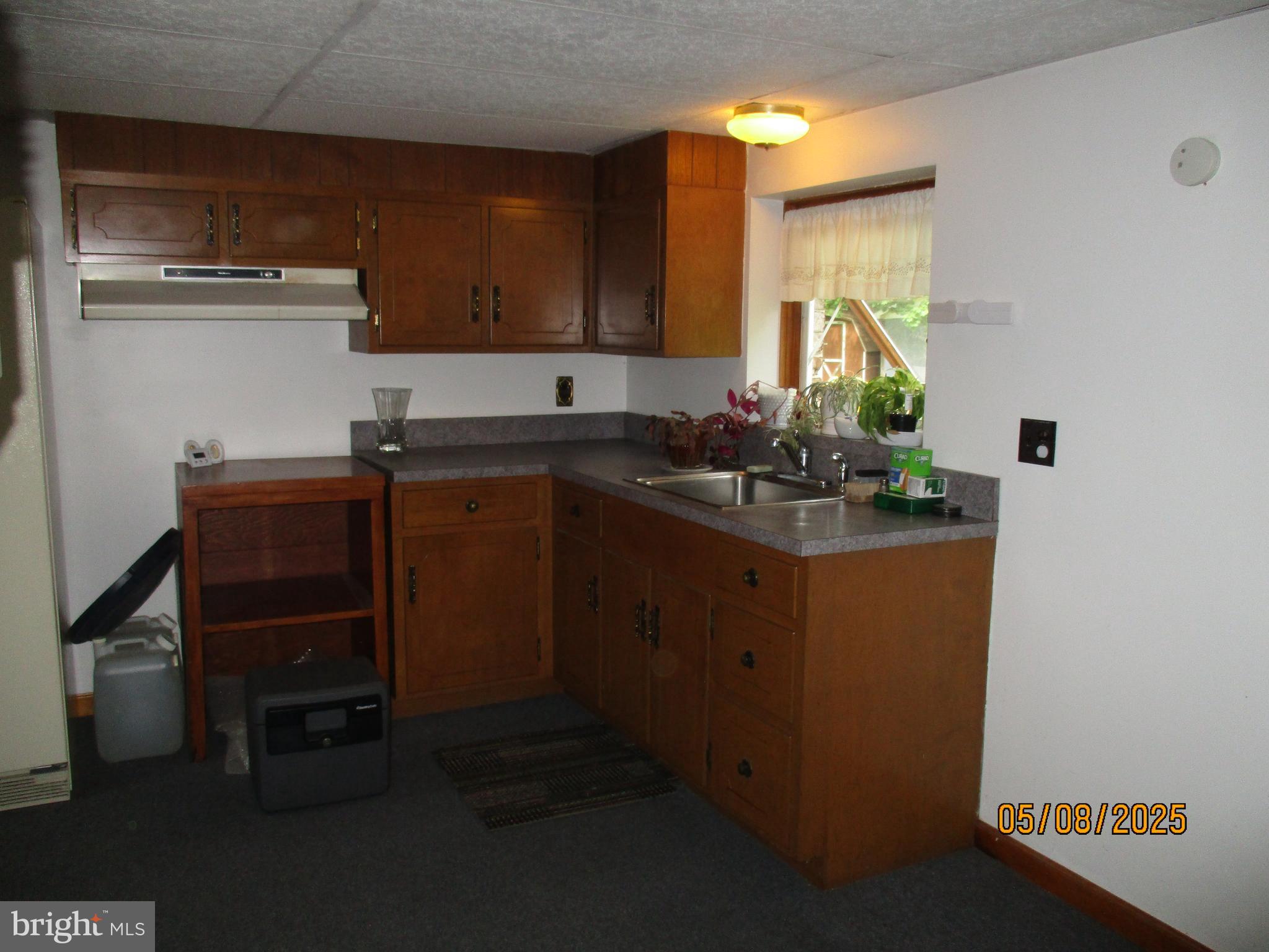 9 Montsera Road Carlisle, PA 17015 - Photo 127 of 142 a kitchen with a sink and cabinets