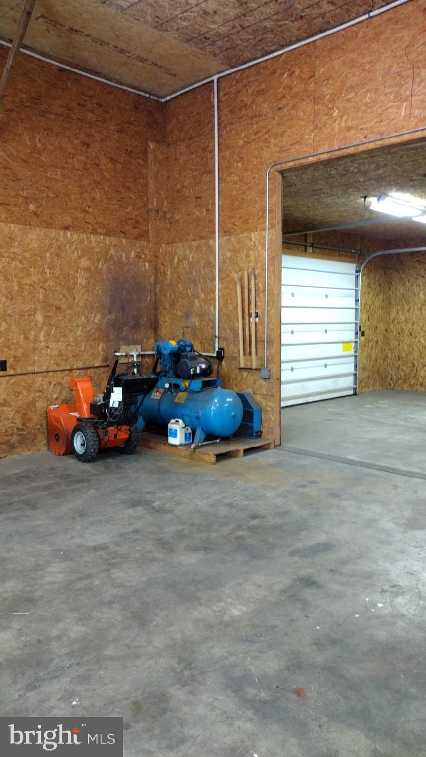 9 Montsera Road Carlisle, PA 17015 - Photo 141 of 142 a couple of cars parked in parking area of a building