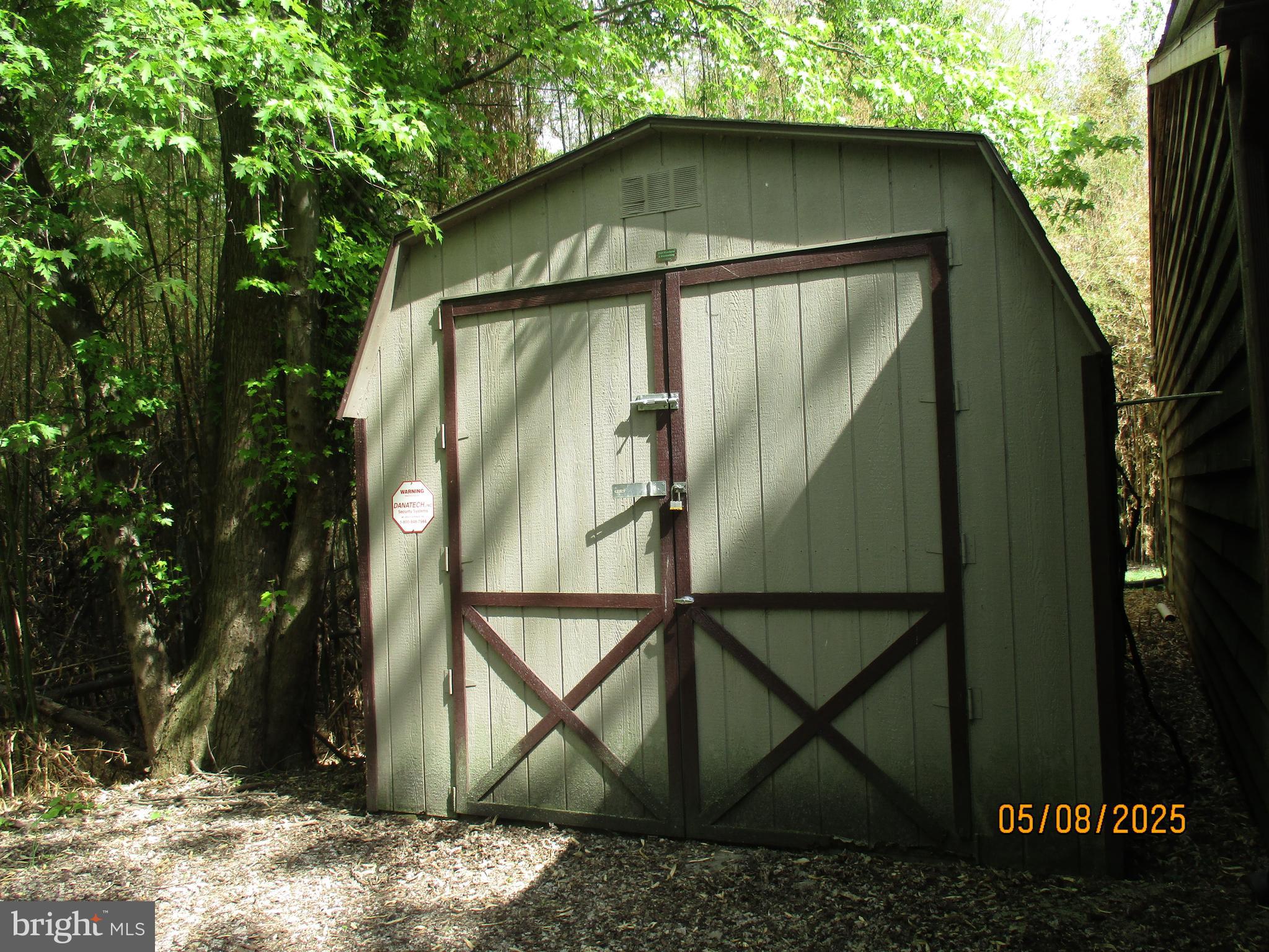 9 Montsera Road Carlisle, PA 17015 - Photo 45 of 142 a small barn in front of a house with wooden fence