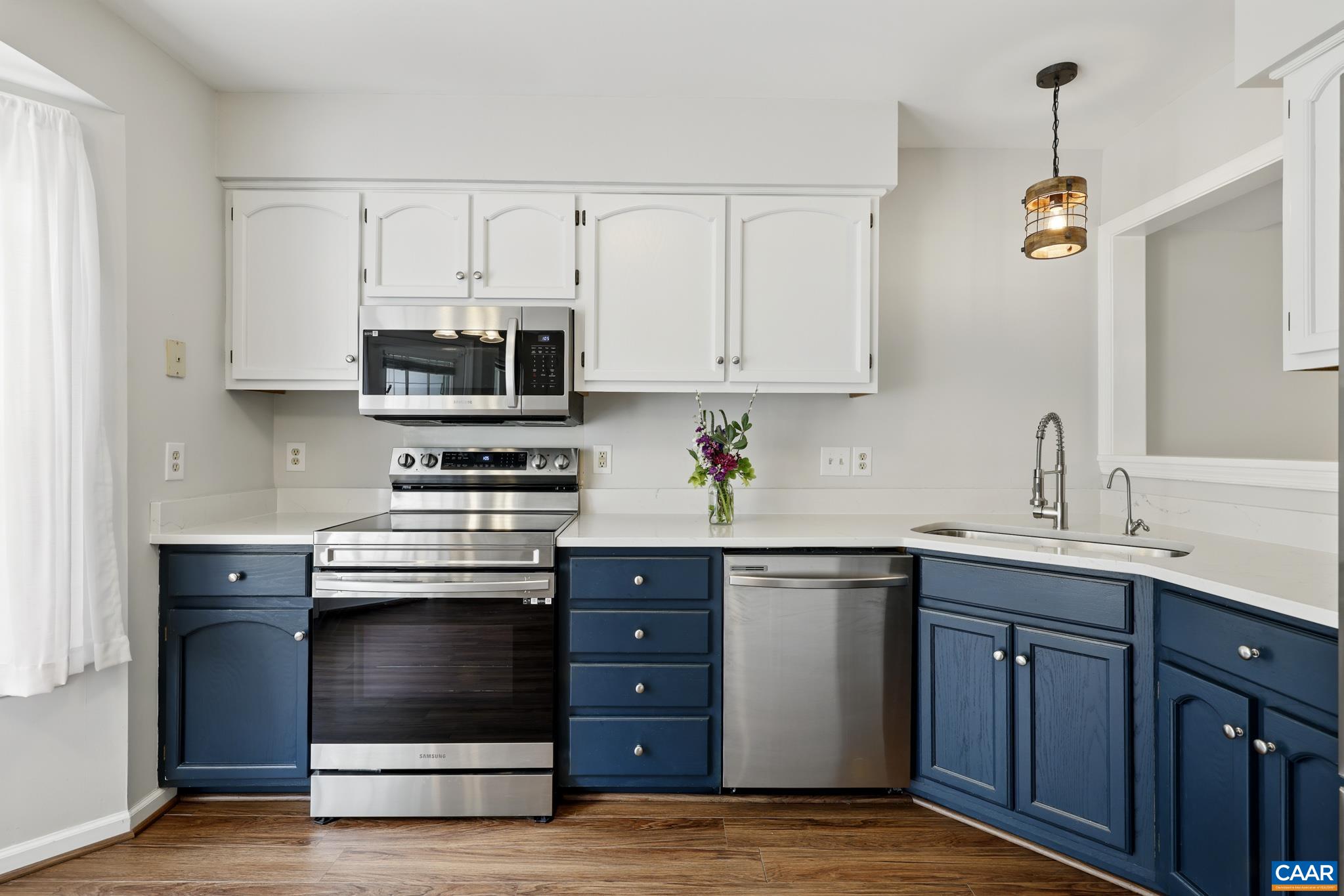3241 Gateway Circle Charlottesville, VA 22911 - Photo 12 of 35 a kitchen with stainless steel appliances granite countertop a sink and a stove