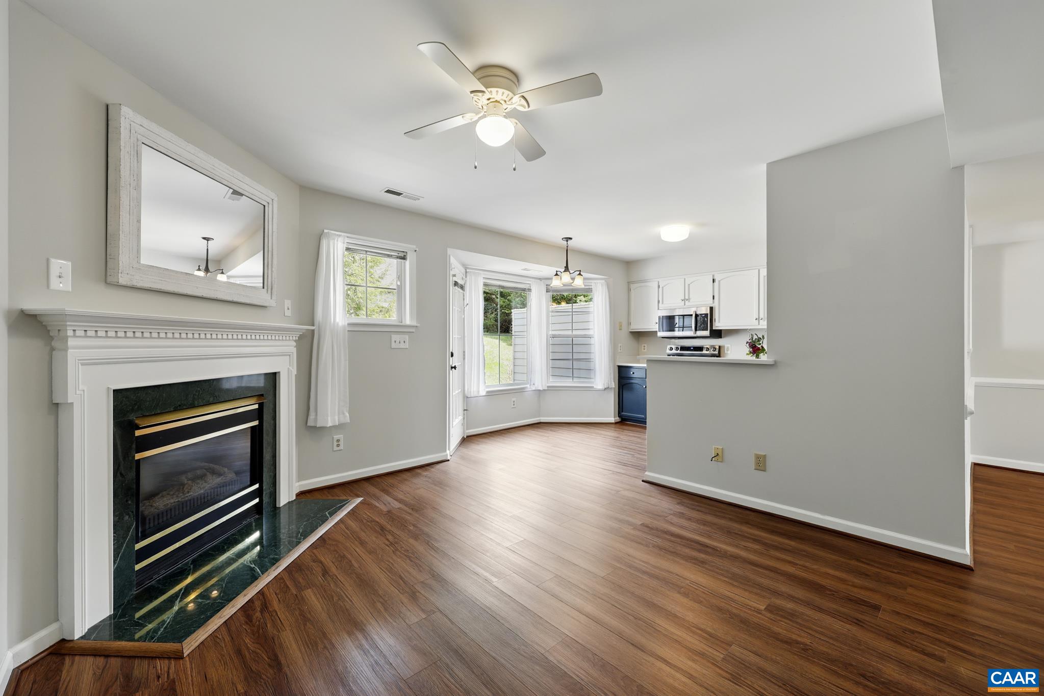 3241 Gateway Circle Charlottesville, VA 22911 - Photo 17 of 35 a view of empty room with wooden floor and fireplace
