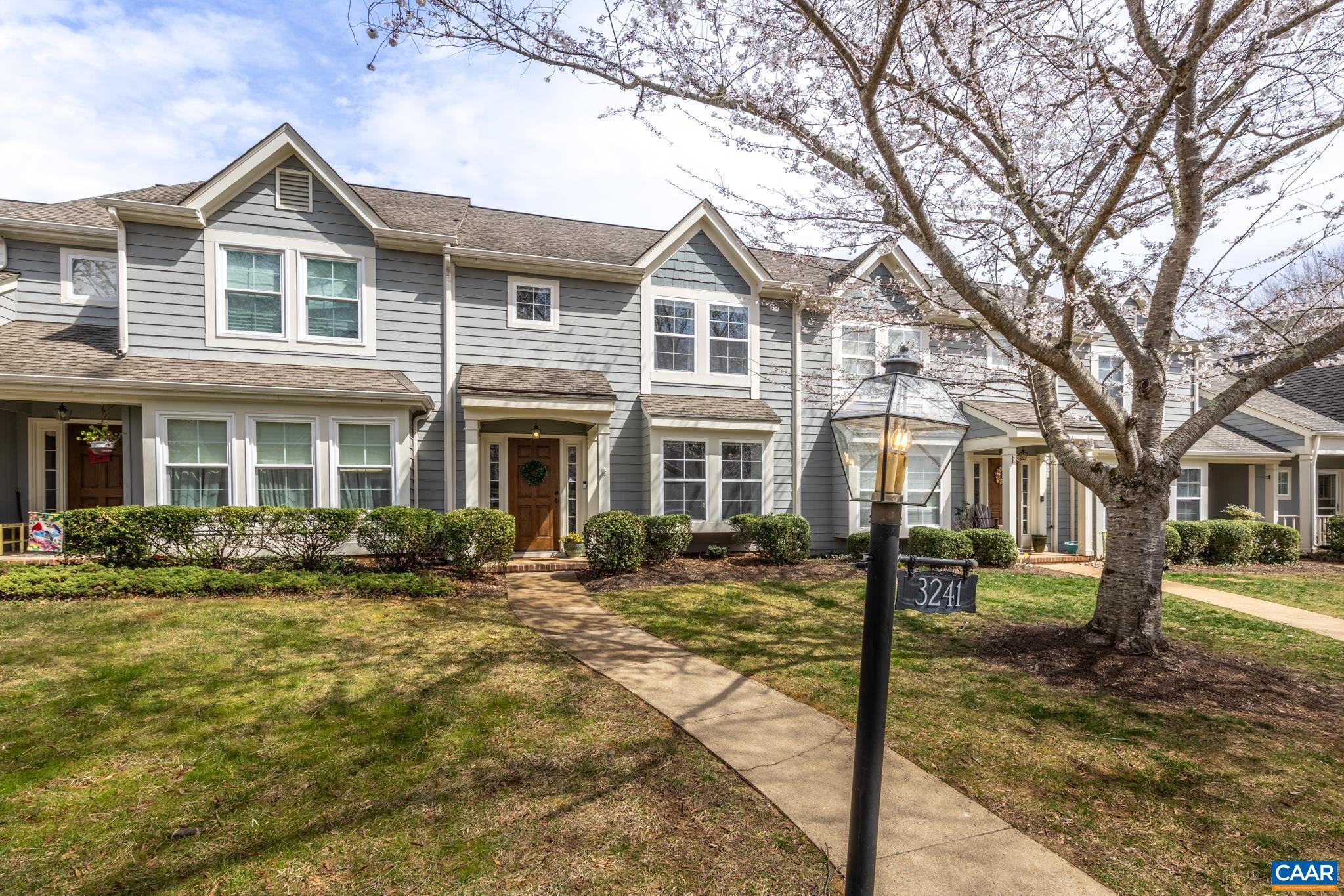 3241 Gateway Circle Charlottesville, VA 22911 - Photo 2 of 35 a front view of a house with a yard