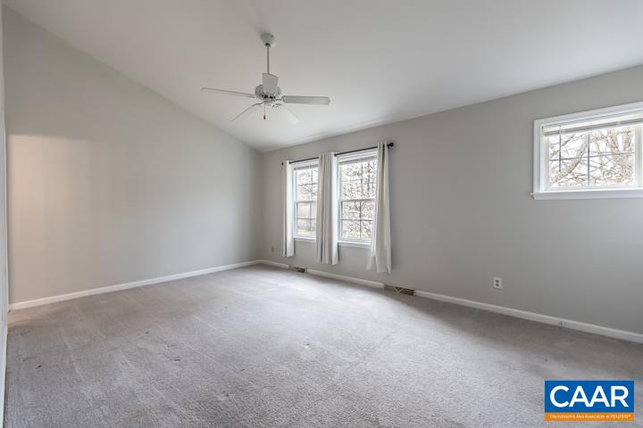 3241 Gateway Circle Charlottesville, VA 22911 - Photo 23 of 35 an empty room with windows and fan