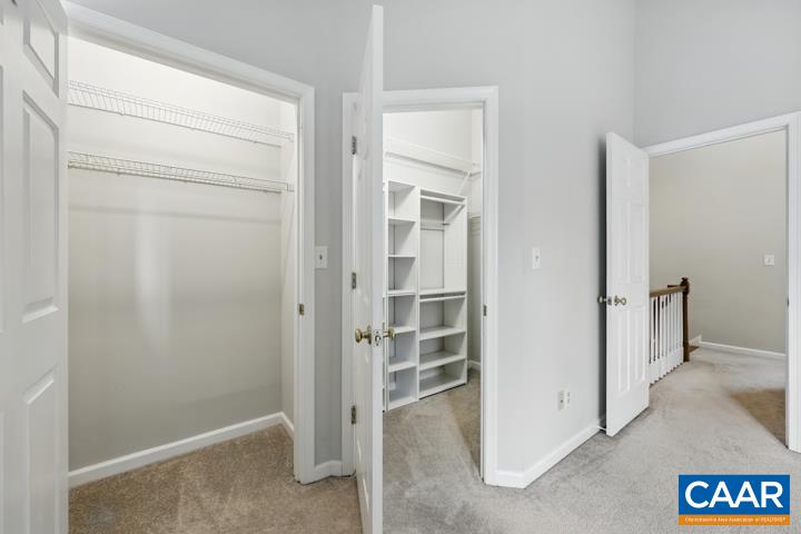3241 Gateway Circle Charlottesville, VA 22911 - Photo 24 of 35 a view of a hallway with wooden shelves