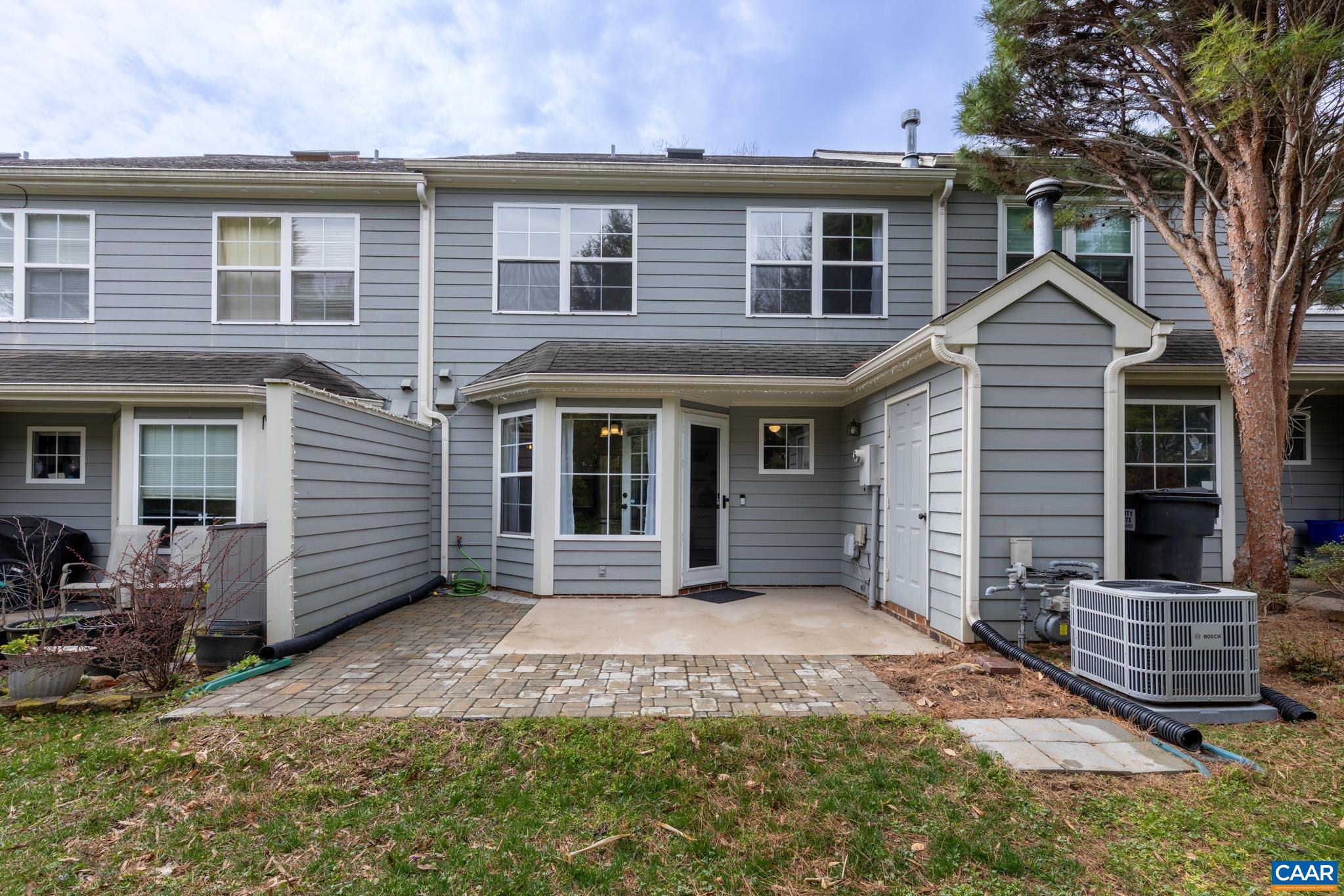 3241 Gateway Circle Charlottesville, VA 22911 - Photo 33 of 35 a front view of a house with a garden