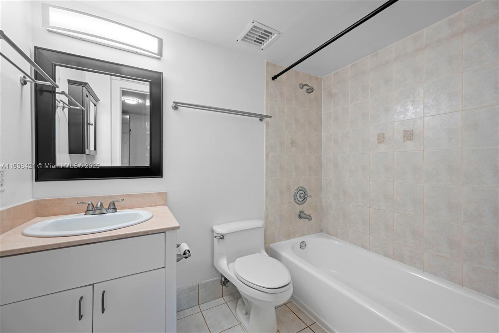 8888 Collins Avenue, Unit 105 Surfside, FL 33154 - Photo 17 of 29 a bathroom with a sink toilet and shower