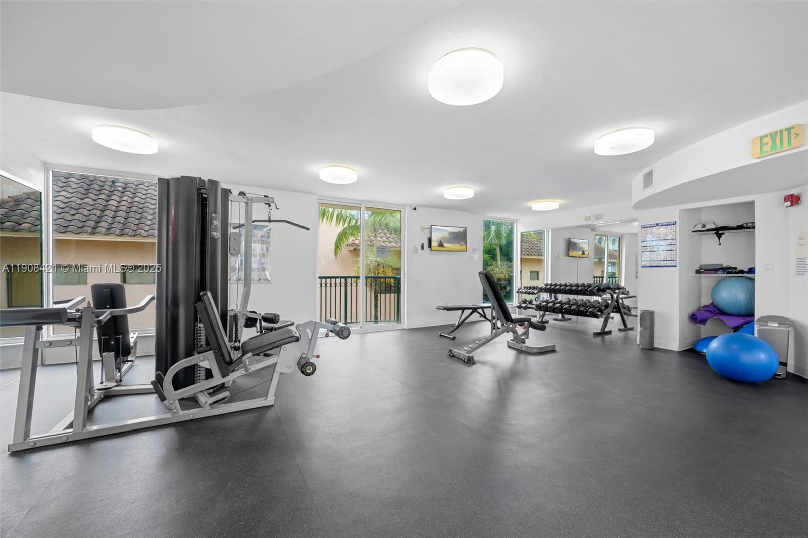 8888 Collins Avenue, Unit 105 Surfside, FL 33154 - Photo 24 of 29 a view of a room with gym equipment