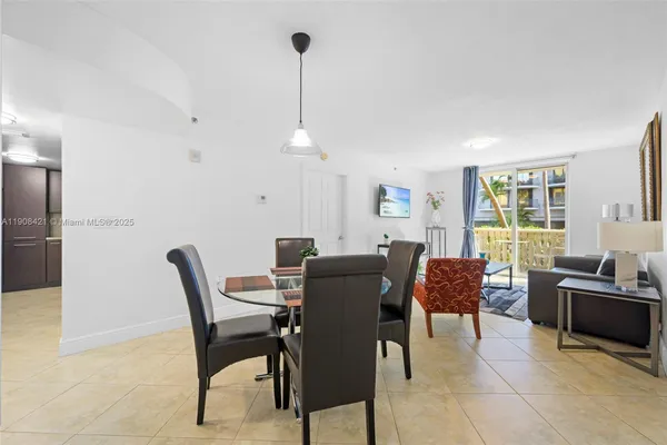 a view of a dining room with furniture