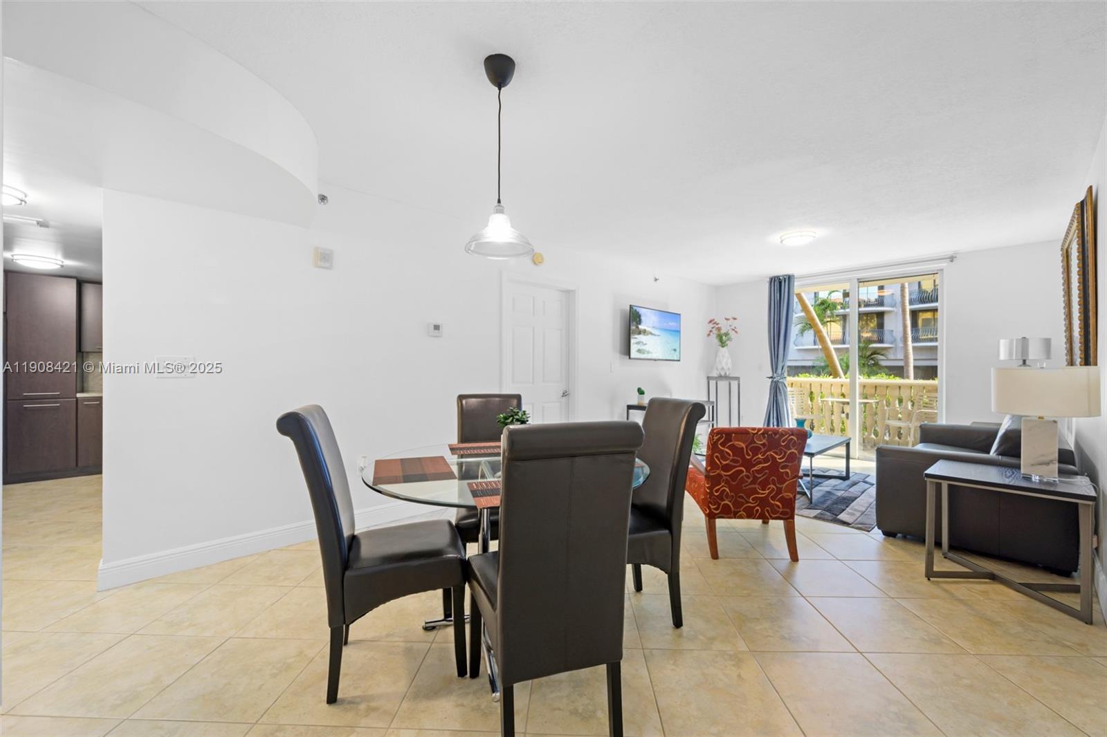 8888 Collins Avenue, Unit 105 Surfside, FL 33154 - Photo 4 of 29 a view of a dining room with furniture