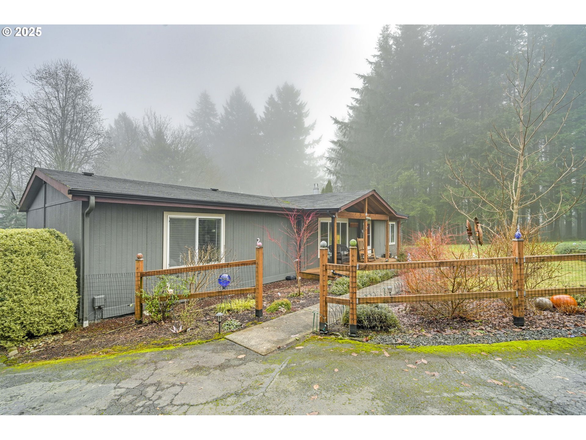 171 Car Road Longview, WA 98632 - Photo 1 of 45 a house view with a garden space