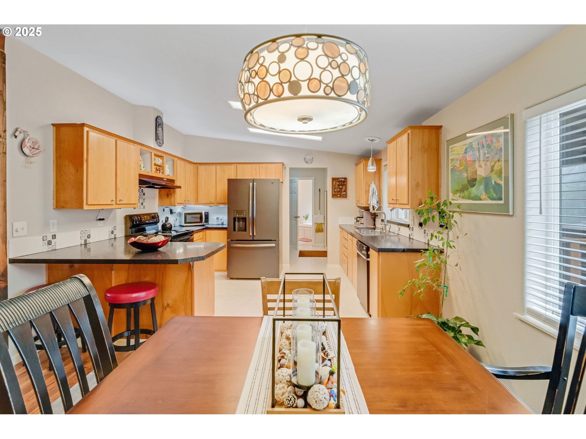 171 Car Road Longview, WA 98632 - Photo 12 of 45 a open kitchen with stainless steel appliances granite countertop a stove refrigerator and a sink