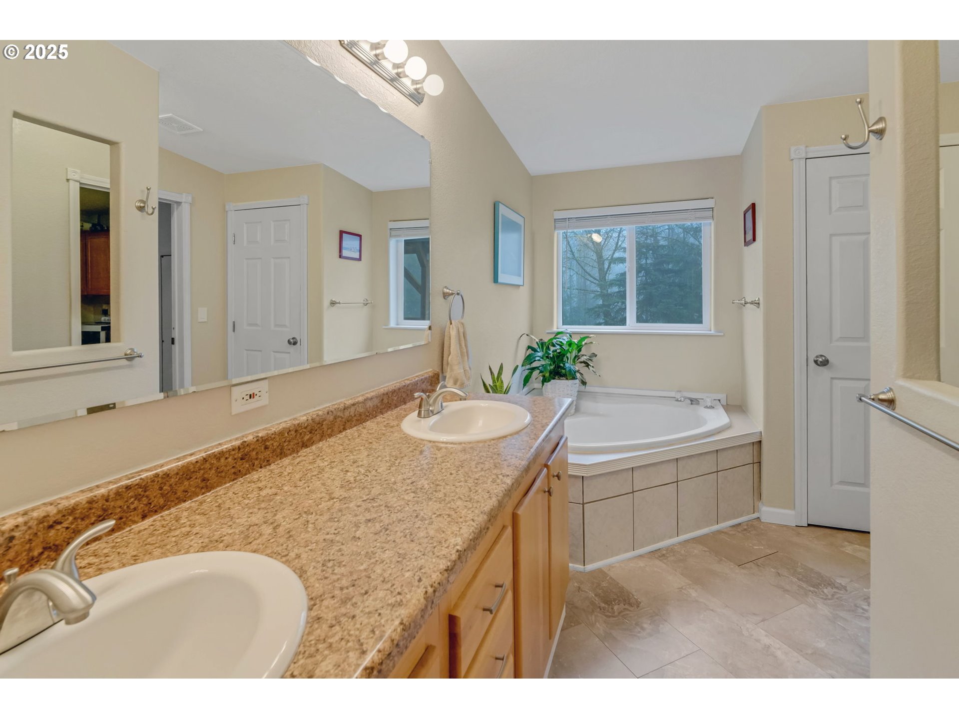 171 Car Road Longview, WA 98632 - Photo 17 of 45 a bathroom with a granite countertop tub sink and mirror
