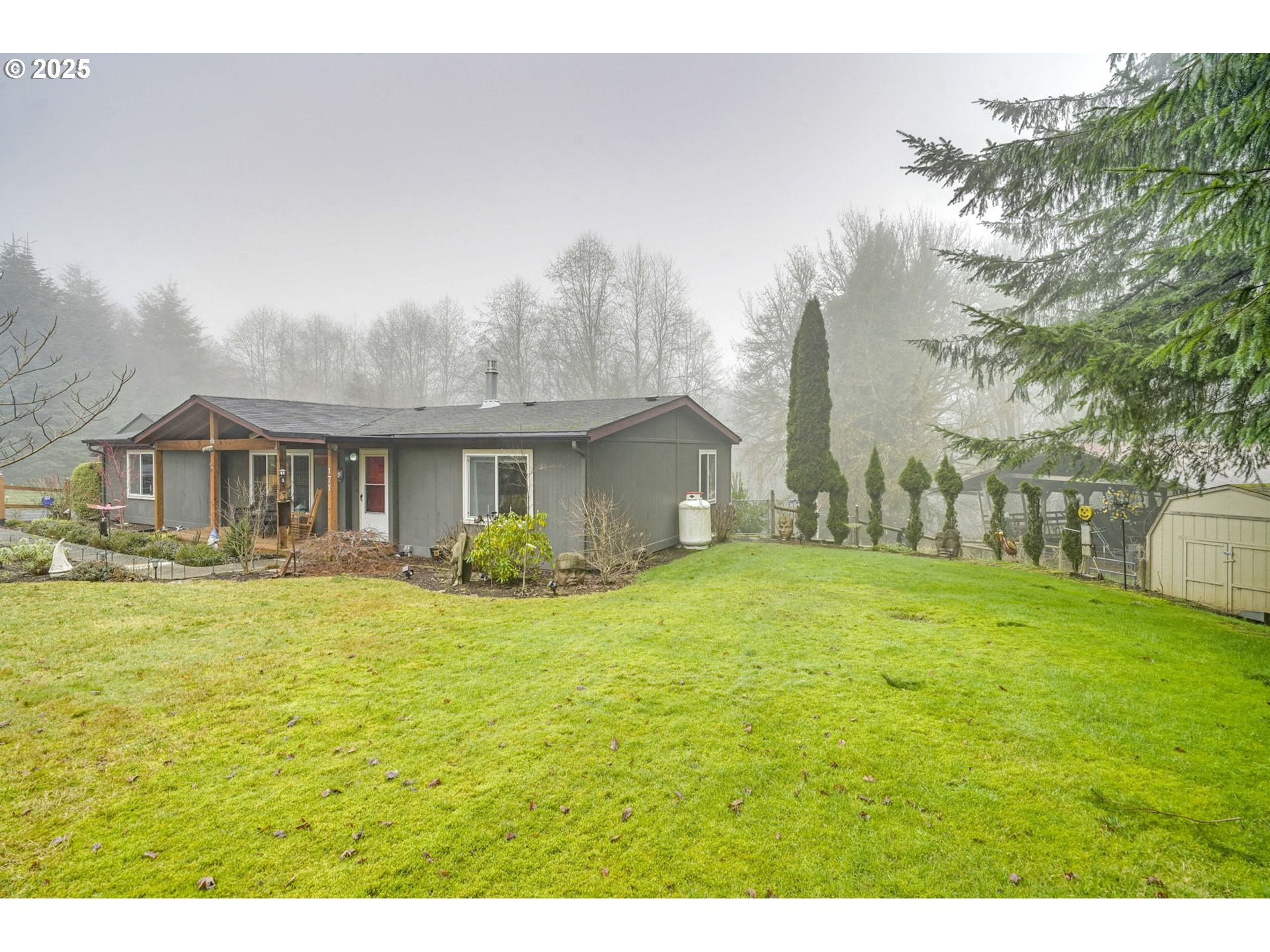 171 Car Road Longview, WA 98632 - Photo 2 of 45 a front view of house with yard and seating area