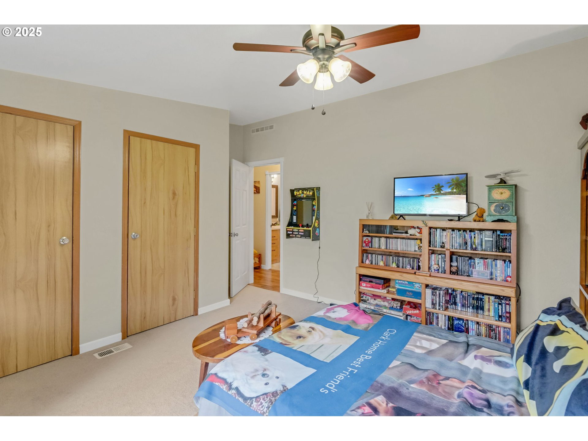171 Car Road Longview, WA 98632 - Photo 23 of 45 a living room with furniture and a book shelf