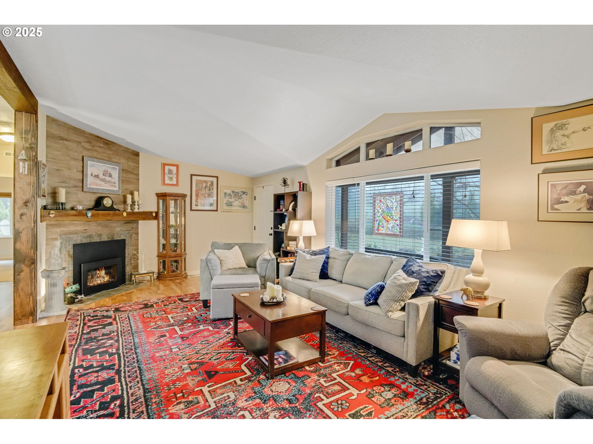 171 Car Road Longview, WA 98632 - Photo 8 of 45 a living room with furniture a rug and a fireplace