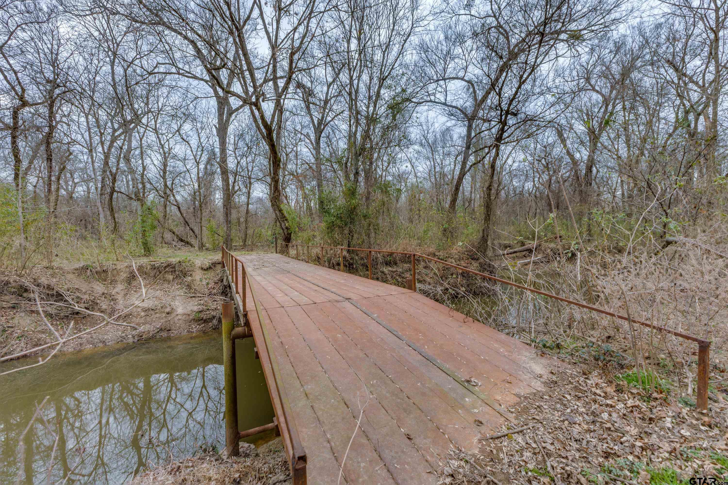 900 West Fm Saltillo, TX 75478 - Photo 1 of 36 a view of a yard with wooden fence