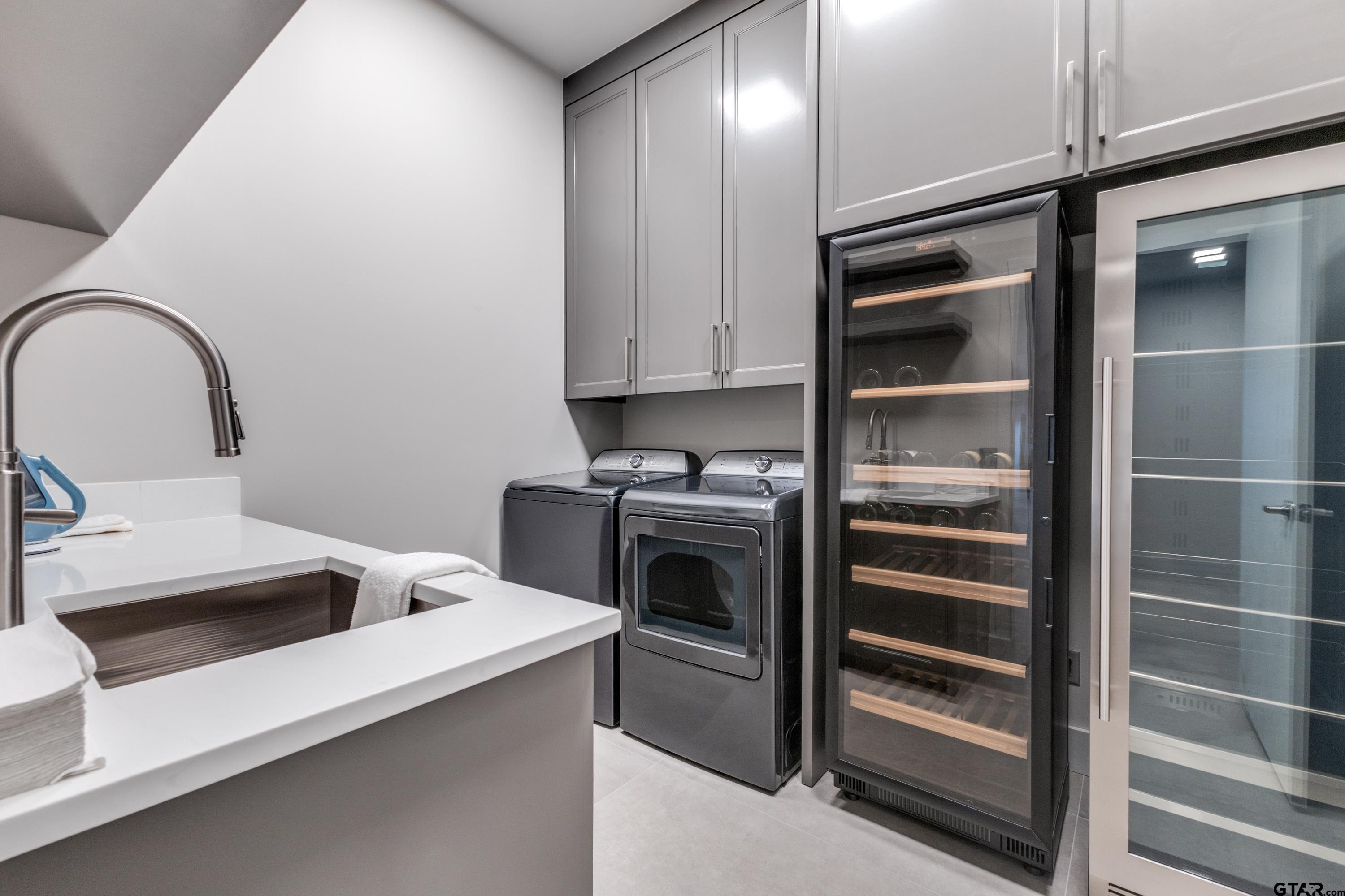 900 West Fm Saltillo, TX 75478 - Photo 11 of 36 a kitchen with a refrigerator and a sink
