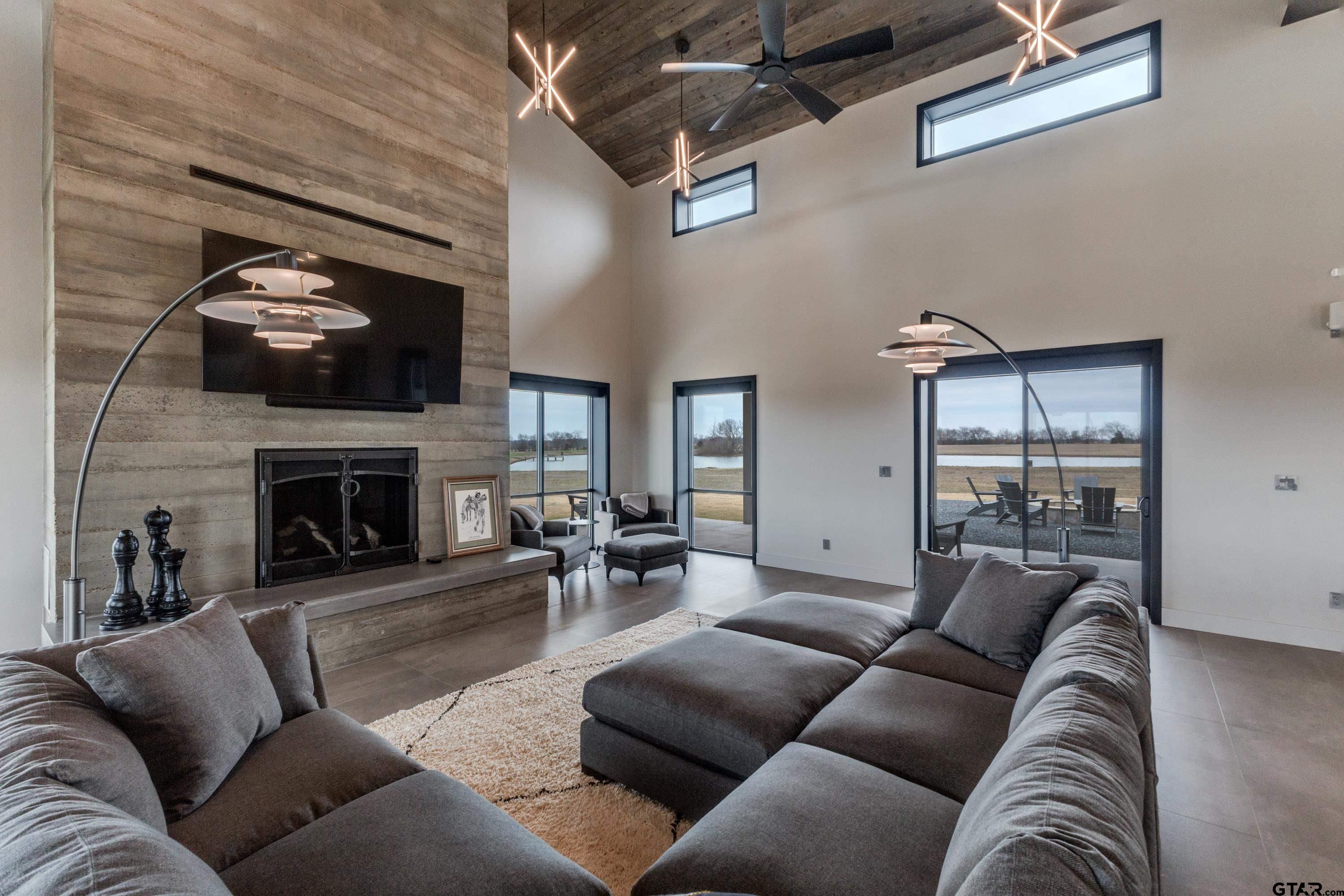 900 West Fm Saltillo, TX 75478 - Photo 4 of 36 a living room with furniture and a fireplace