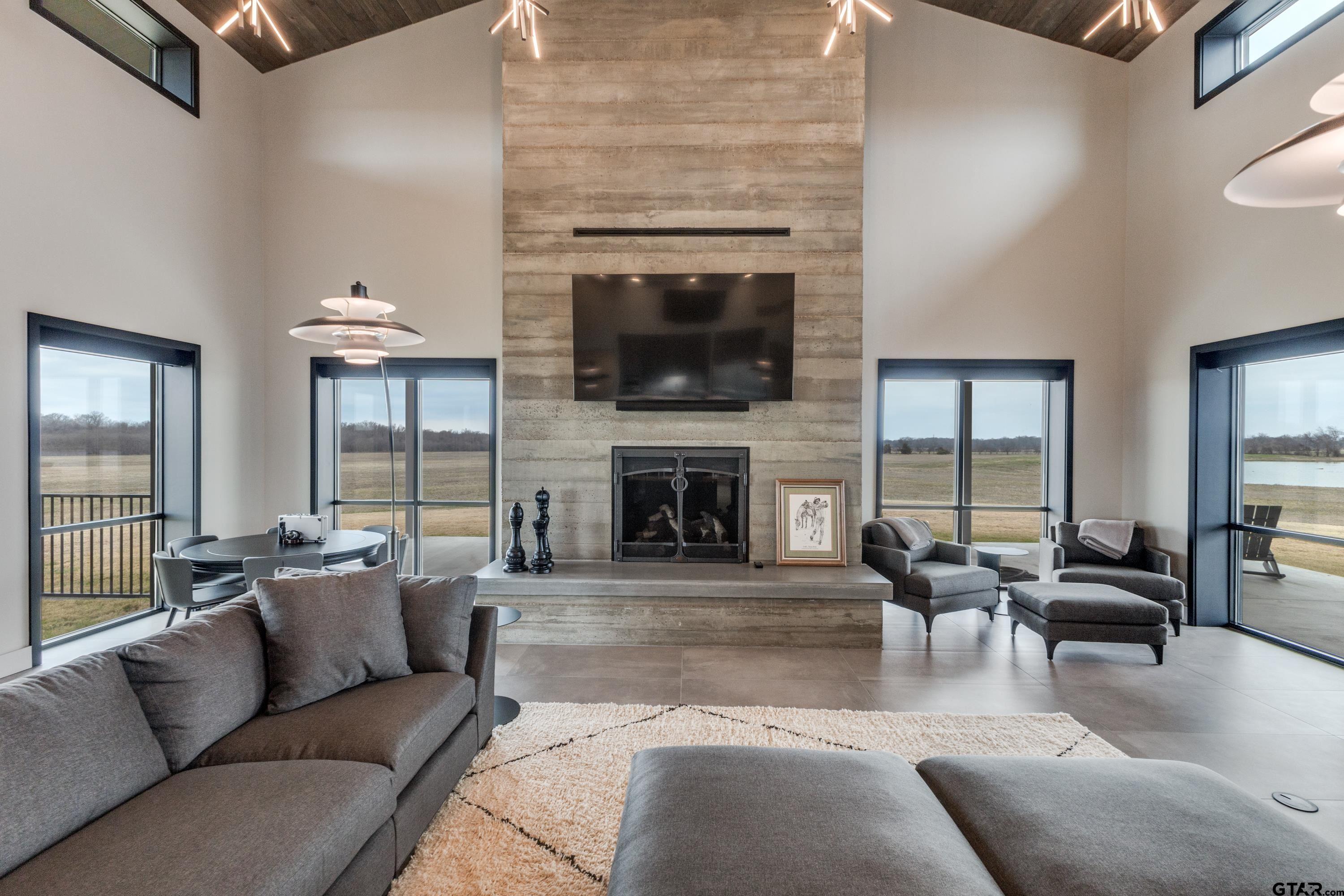 900 West Fm Saltillo, TX 75478 - Photo 5 of 36 a living room with furniture and a fireplace