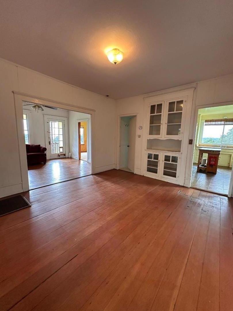 46 Valley View Road Watsonville, CA 95076 - Photo 16 of 55 an empty room with furniture and a fireplace